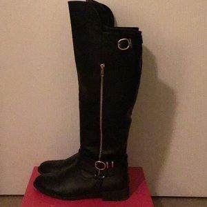 Knee high worn boots